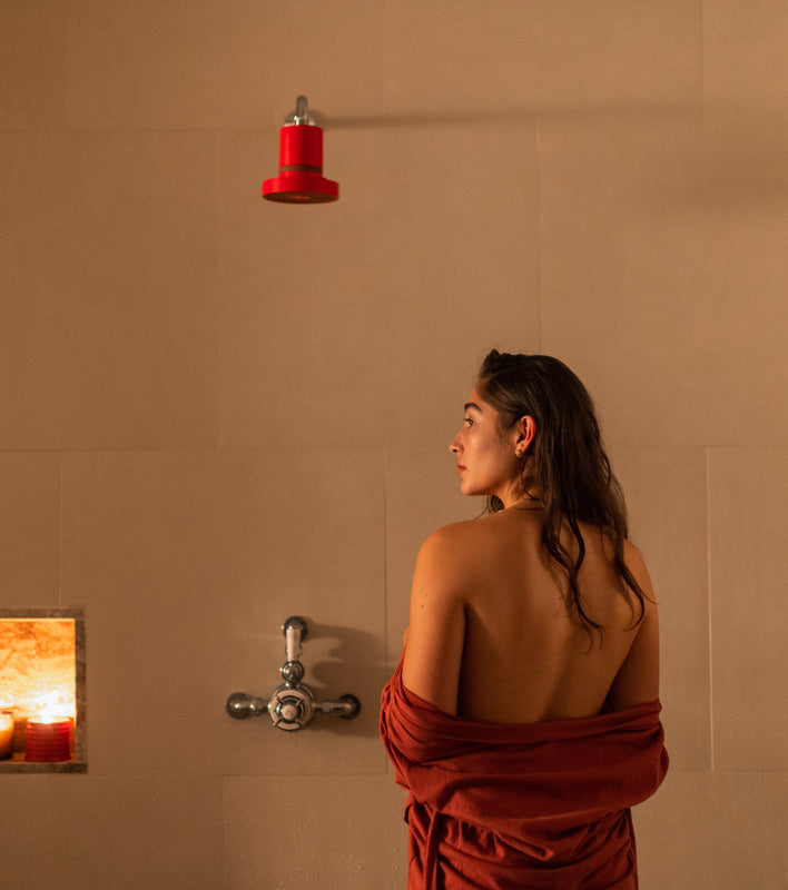 woman in luxury shower using a showerhead water filter