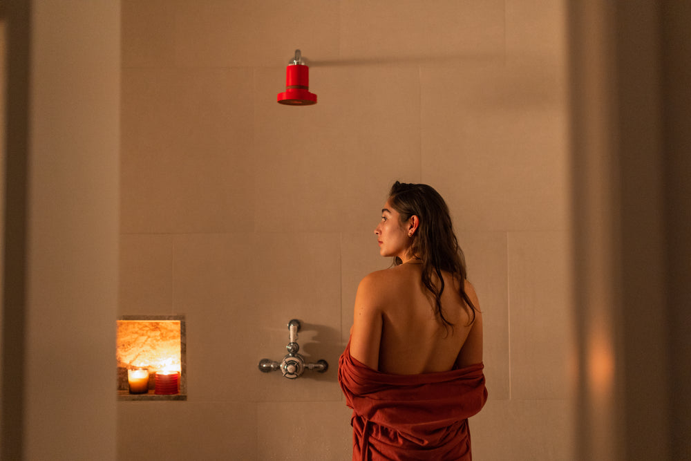 woman in luxury shower using a showerhead water filter